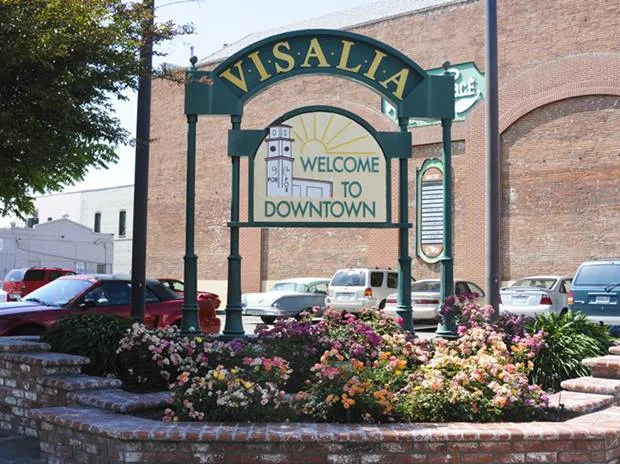 The Welcome to Downtown sign on Main Street in Visalia, California